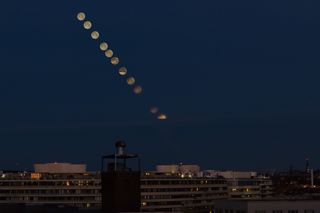 This series of images shows the moon moving down toward the horizon as the natural satellite simultaneously slips into the Earth's shadow during a total lunar eclipse on Jan. 31, 2018.
