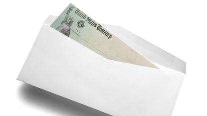 Tax refund check in envelope for unclaimed tax refunds