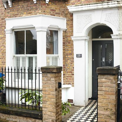 house entrance with white windows