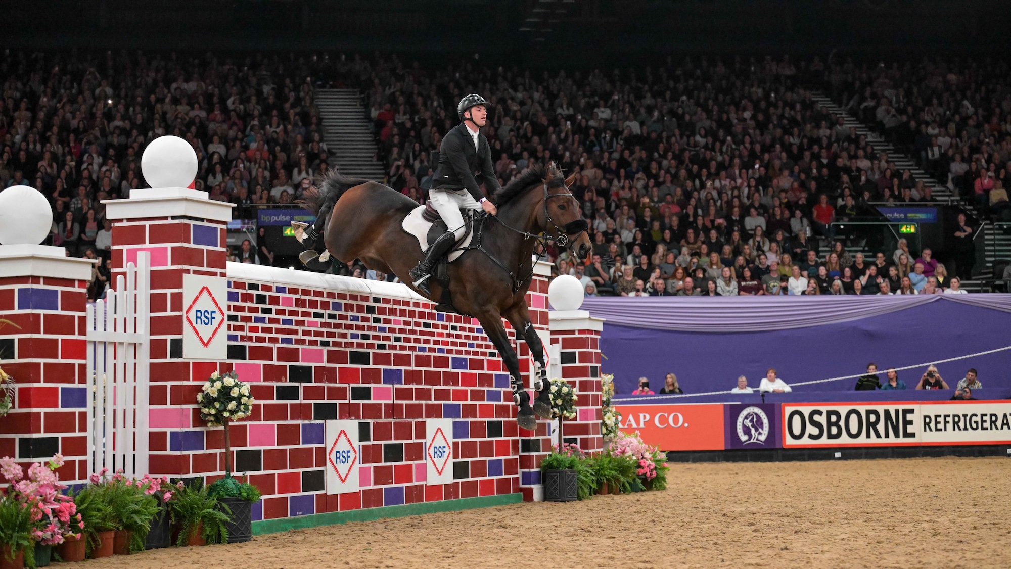 Joseph TRUNKFIELD and LOCOMOTION - Joint Winners - International Showjumping &ndash; Ripon Select Foods Puissance CSI3* - during the Horse of the Year Show held at the NEC in Birmingham in UK between 8 -12 th October 2025