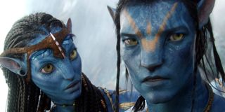 Two Na'vi from Avatar.