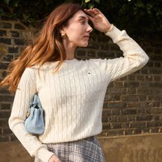 Klaudia wears a Tommy Hilfiger cable knit