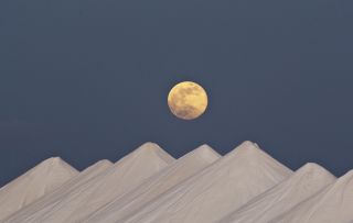 How do you capture the moon's majesty in song? Astrophotographer Stephan Kogelman captured this photograph of the August 2014 supermoon on the Island of Bonaire in the Caribbean, off the coast of Venezuela.