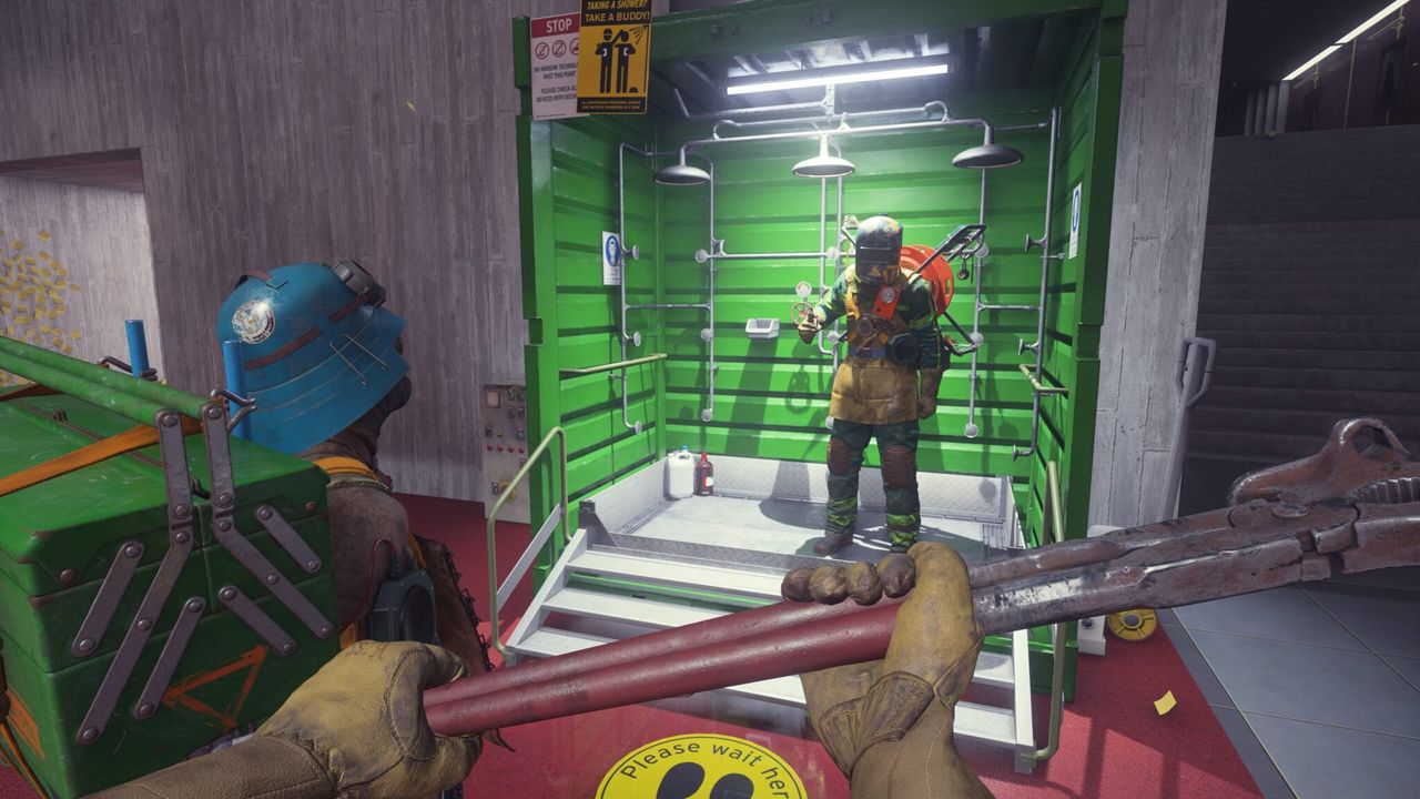 FBC: Firebreak Fightbreak screenshot showing a player emoting as they step into a health-reviving shower
