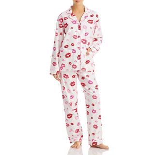 model wearing aqua sleep flannel pajama set with all over lip print