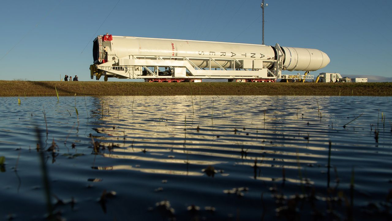 A Northrop Grumman Antares rocket is seen as it rolls out to Pad-0A, Tuesday, Oct. 29, 2019, at NASA's Wallops Flight Facility in Virginia.
