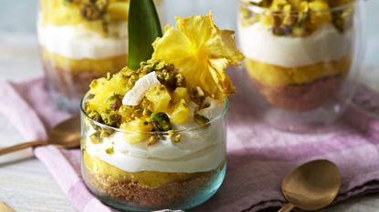 Tropical cheesecake pots in glasses with pineapple crips