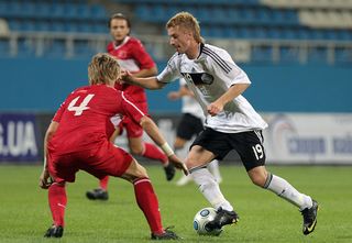 Marco Reus (R) of Germany battles for the ball with Serdar Azis (L) of Turkey during the U21 Lobanowski Cup between Germany and Turkey at the Dynamo stadium on August 11, 2009 in Kiev, Ukraine.