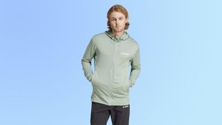 Adidas Terrex XPERIOR Light Fleece Hooded Jacket against gradient background