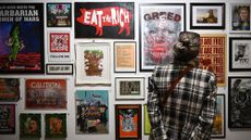 A visitor views artwork at the Revolting Artists exhibition in Weymouth, England