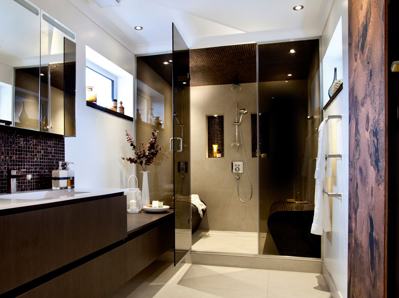 a steam room in a bathroom with luxury touches