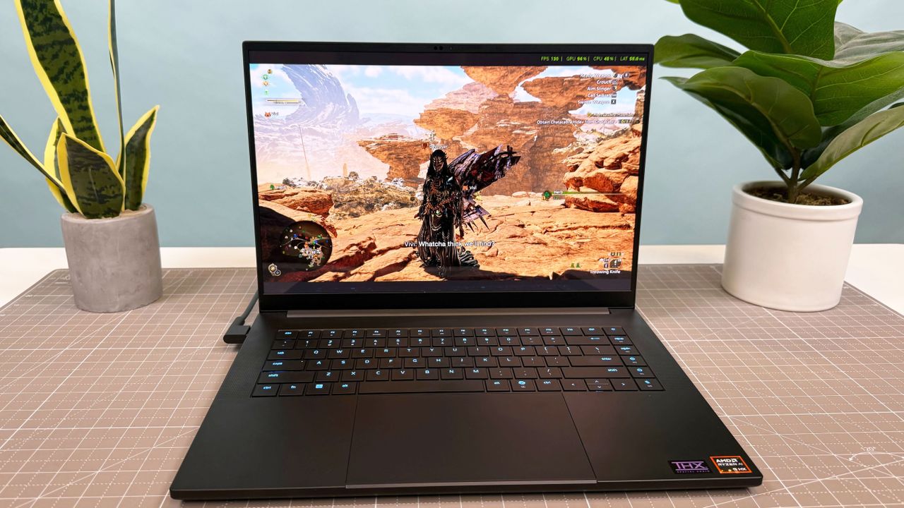 Monster Hunter Wilds gameplay on the Razer Blade 16 (2025) with an Nvidia RTX 5090 Laptop GPU. The fps counter in the upper right-hand corner of the display shows the frame rates with DLSS 3.7 and frame-gen enabled.