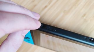 Nintendo Switch reset hold power button
