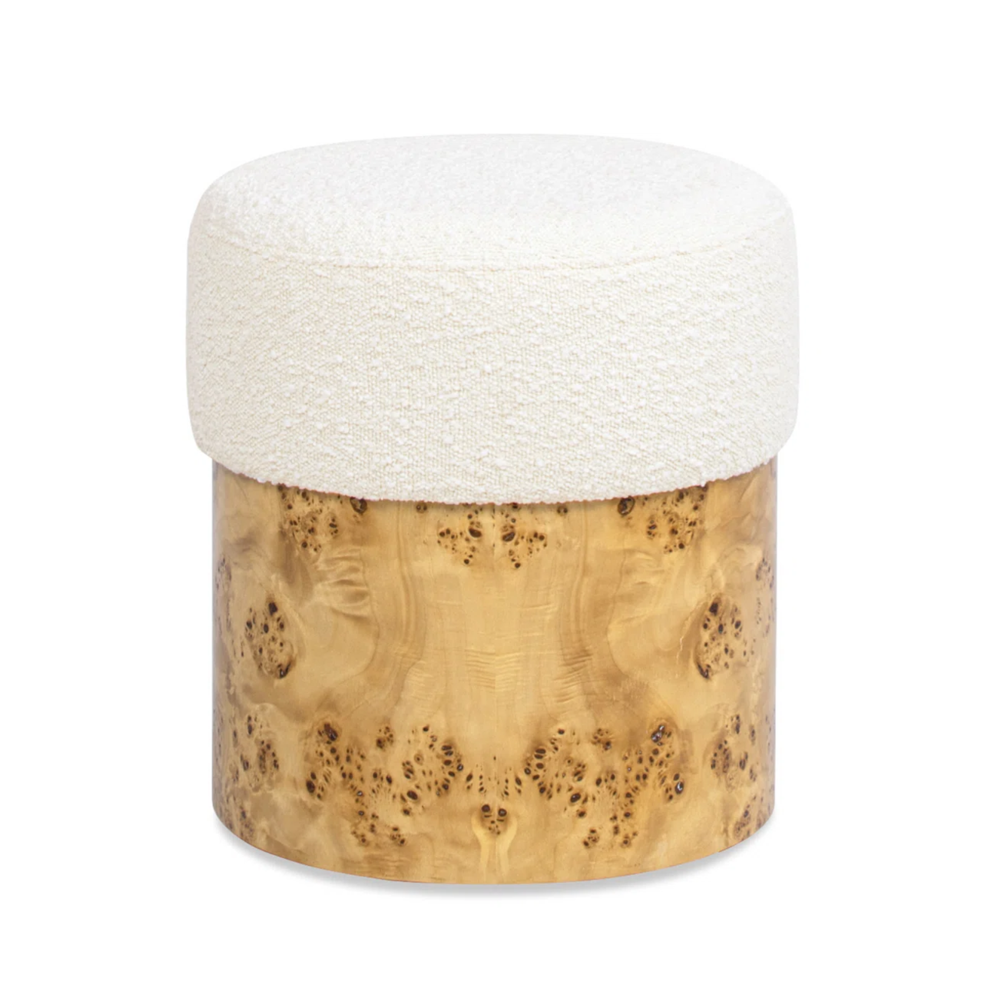 a burl wood ottoman with a boucle fabric top