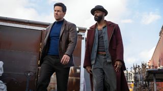 L-R: Parker (Mark Wahlberg) and Grofield (LaKeith Stanfield) stand side-by-side in a scene from Prime Video's "Play Dirty"