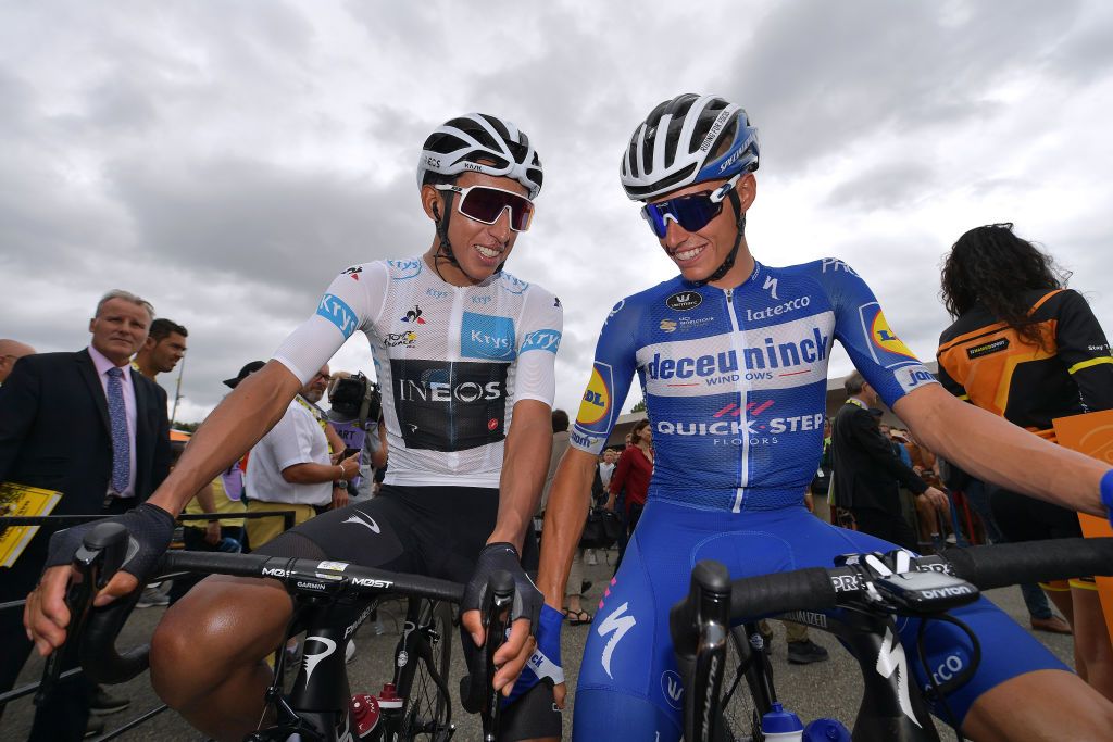 Egan Bernal and Enric Mas chat before the start of stage 12