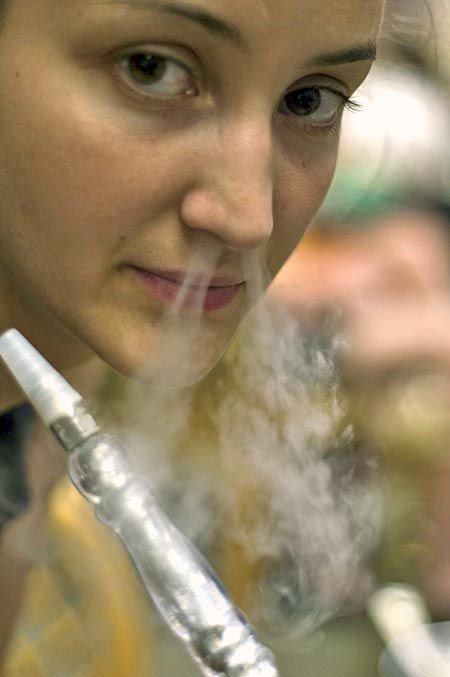 Hookah smokers inhale toxic chemicals that may harm the heart, report warns