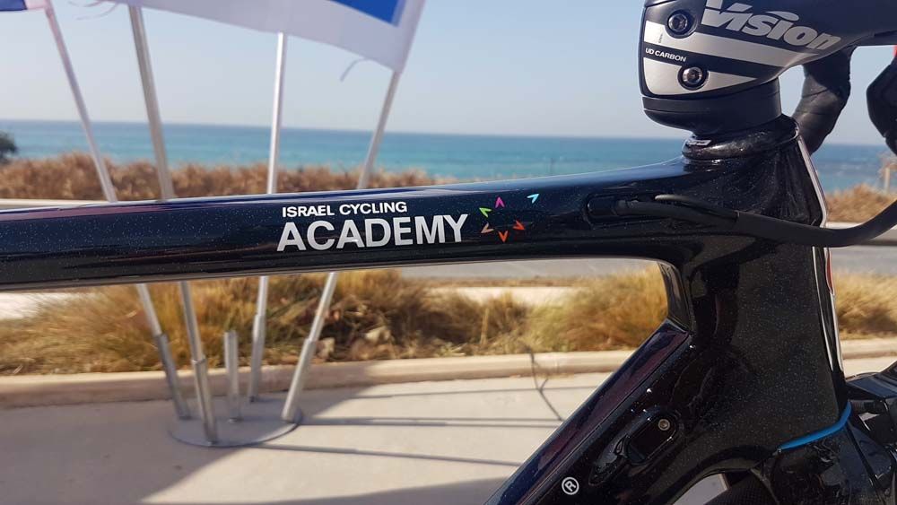 The black paint job has a glittering finish that sparkles in the sun