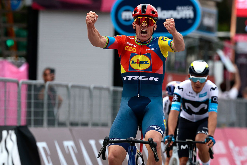Lidl-Trek's Danish rider Mads Pedersen celebrates as he crosses the finish to win the first stage of the 108th Giro d'Italia cycling race, 160km from Durres to Tirana in Albania, on May 9, 2025. (Photo by Luca Bettini / AFP)