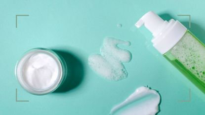 A jar and tube of skincare products on a blue background, to choose between glycolic acid vs salicylic acid 