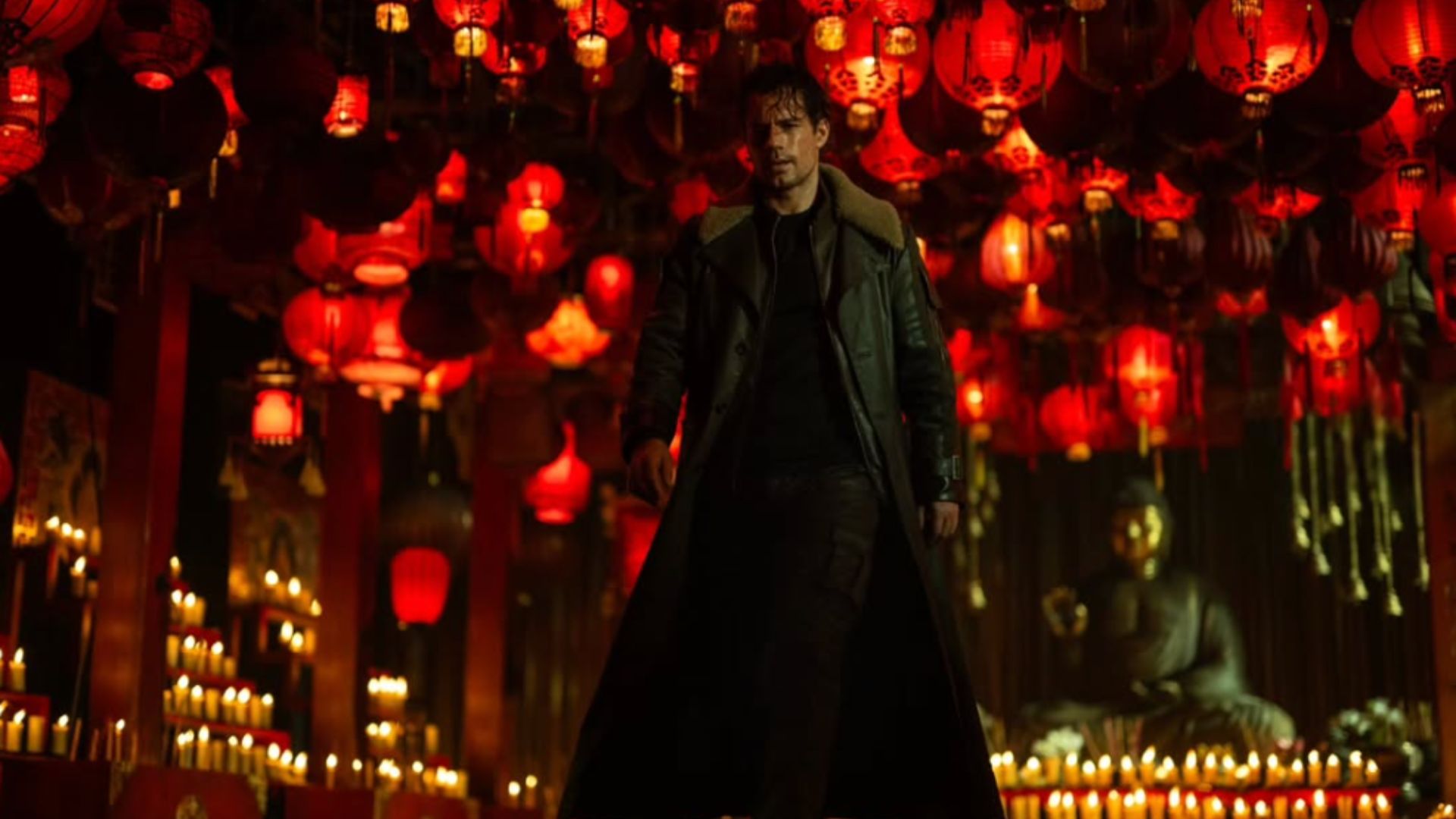 an image of henry cavill as highlander in some kind of temple surrounded by candles and red lanterns