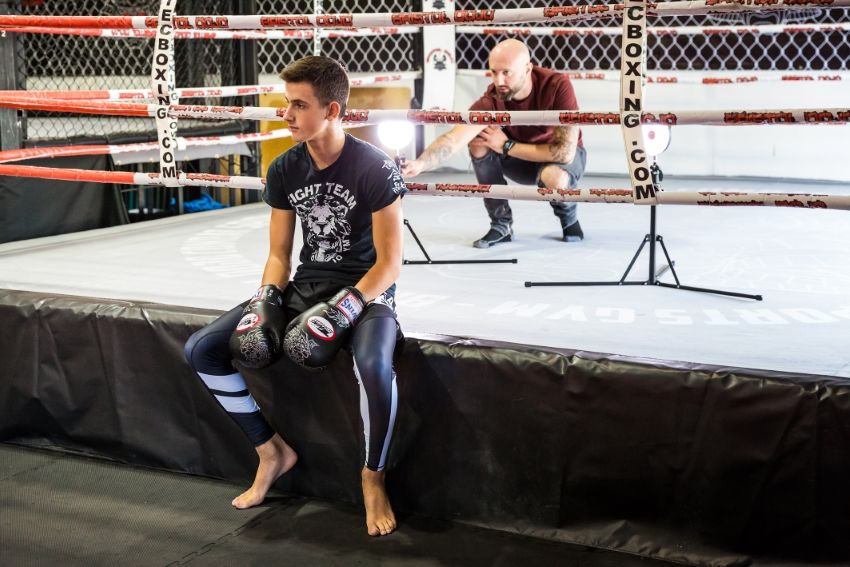 martial arts fight in dojo ring getting ready to be photographed