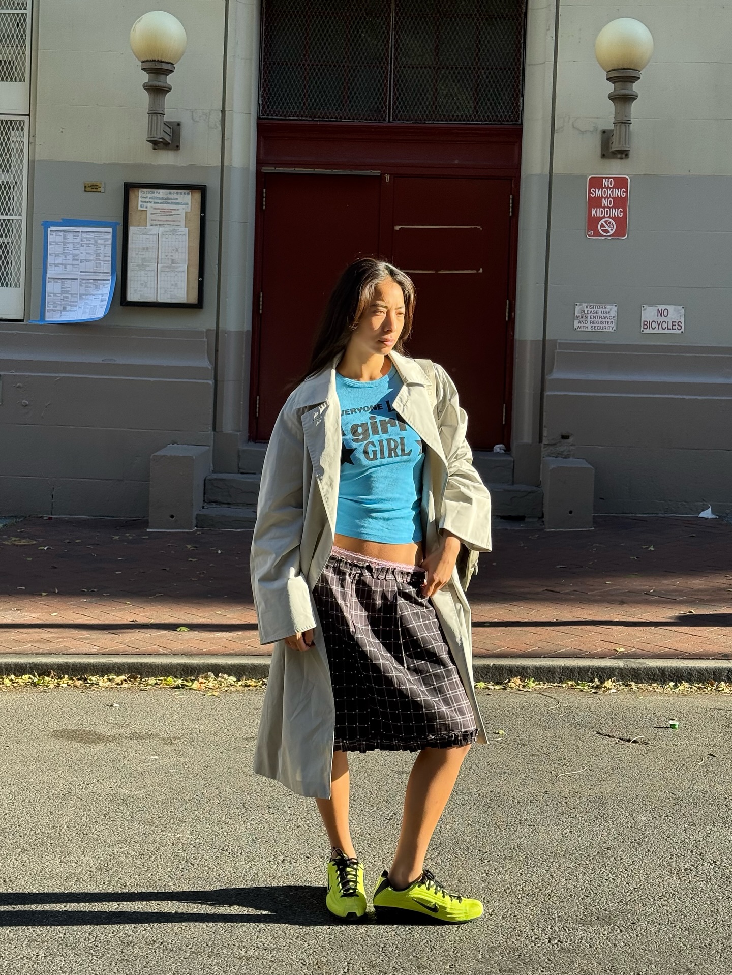 Michelle Li in a knee-length skirt