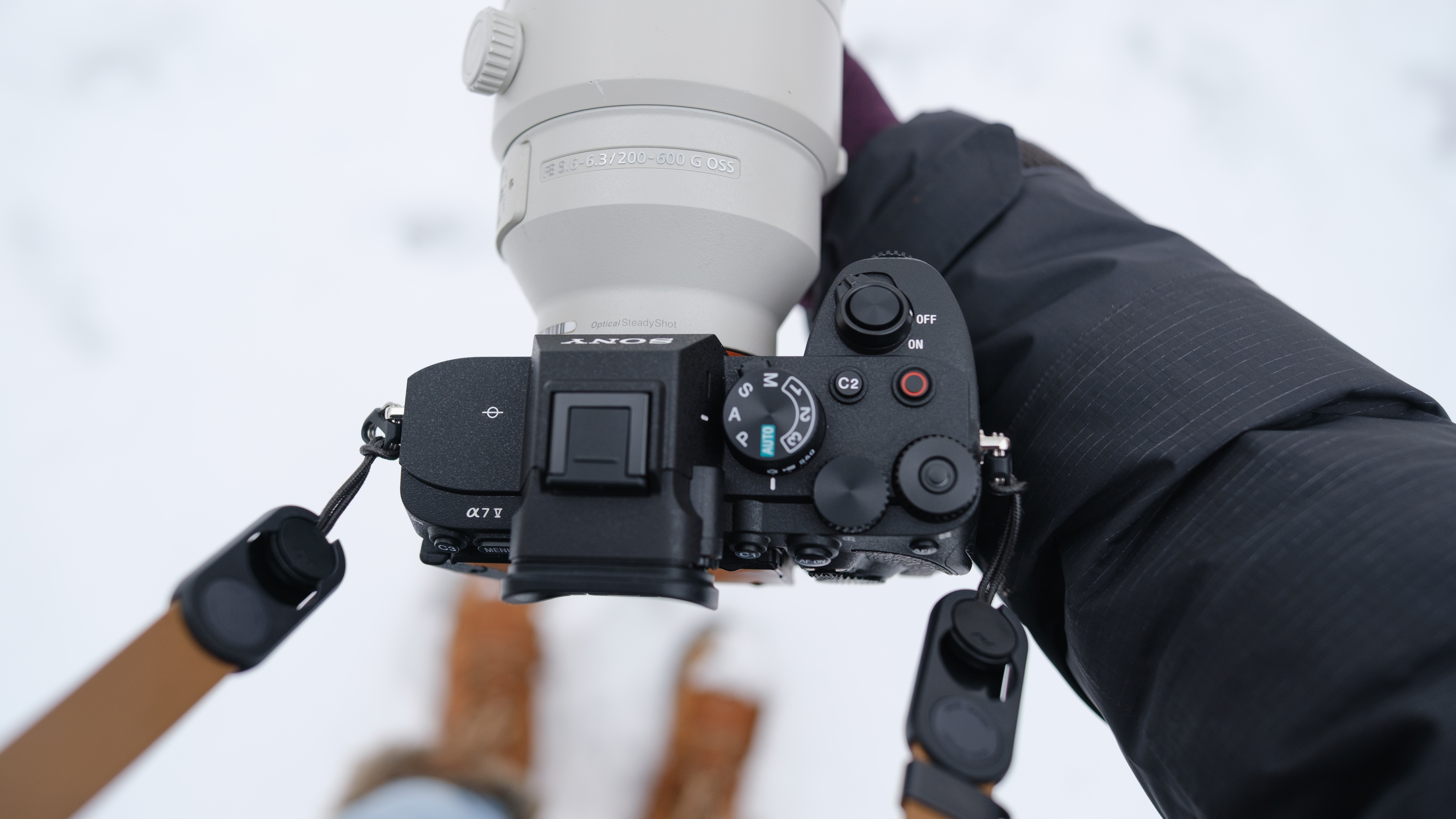 The Sony A7 V covered in snow