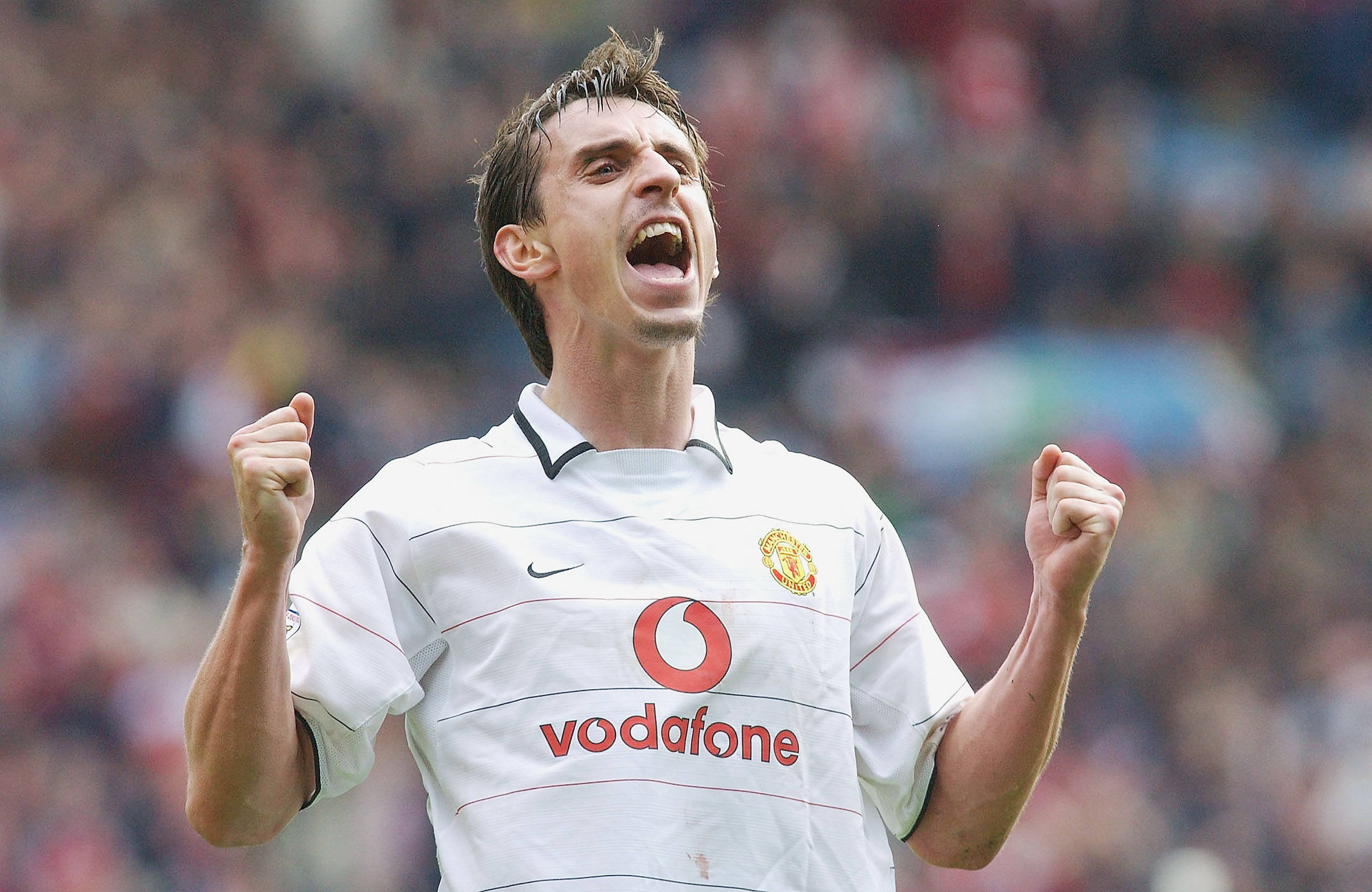 Gary Neville celebrates victory for Manchester United against Arsenal in the FA Cup semi-finals in April 2004.