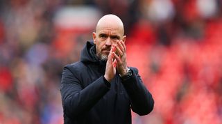 Manchester United manager Erik ten Hag applauds the fans at Old Trafford after a draw against Burnley in April 2024.