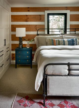 Cozy bedroom in modern cabin