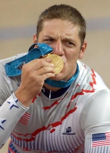 Marty Nothstein savors his gold medal in the 2000 Sydney Olympic Games
