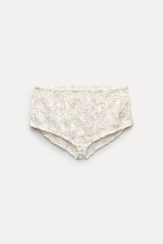 Shorts with pearl embroidery