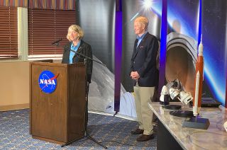 NASA Deputy Administrator Pam Melroy talks to reporters at the Johnson Space Center in Houston, Texas as NASA Administrator Bill Nelson looks on, Thursday, Sept. 2, 2021.