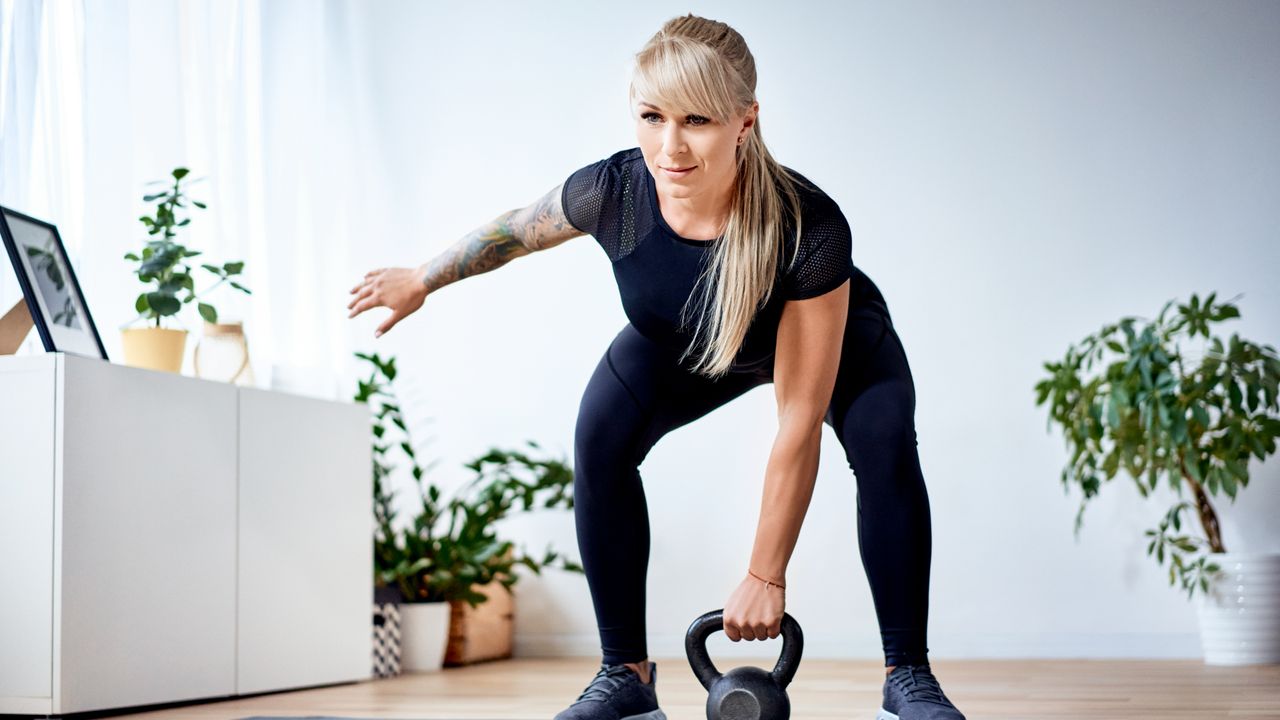 Woman exercising with a kettlebell