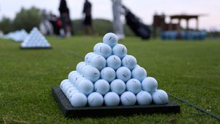 Image of a pyramid of golf balls