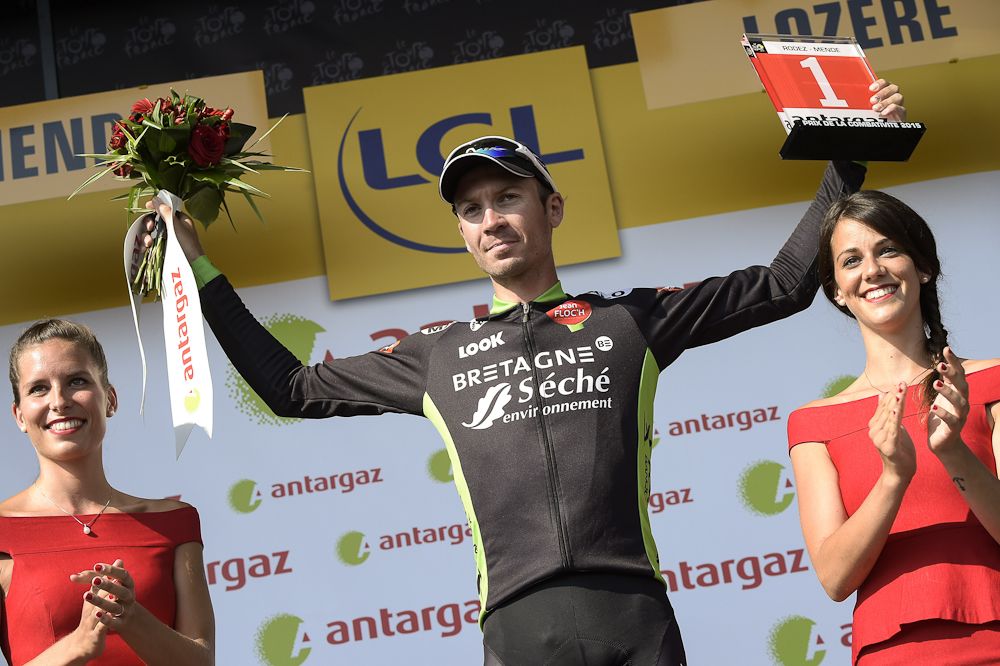 Pierre-Luc Perichon celebrates his combativity prize on the podium at the end of the 178,5 km fourteenth stage of the 102nd edition of the Tour de France