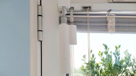 SwitchBot Blind Tilt attached to blind wand