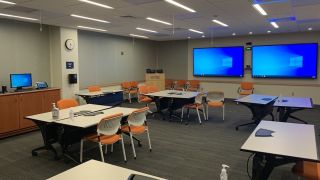 A multipurpose space for collaboration and conferencing, in MITRE’s Bedford, MA location.