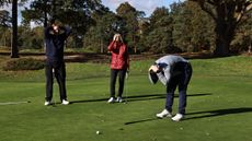 Golfers showing frustration on the green