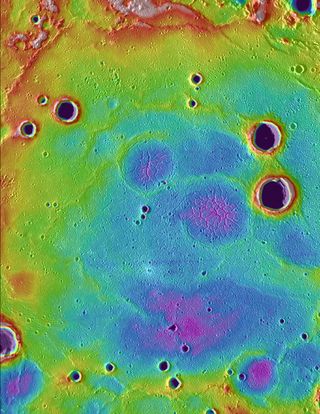 Ancient volcanic plains in the northern high latitudes of Mercury revealed by NASA's Messenger spacecraft. Purple colors are low and white is high, spanning a range of about 1 km. Width of area spans about 250 km.