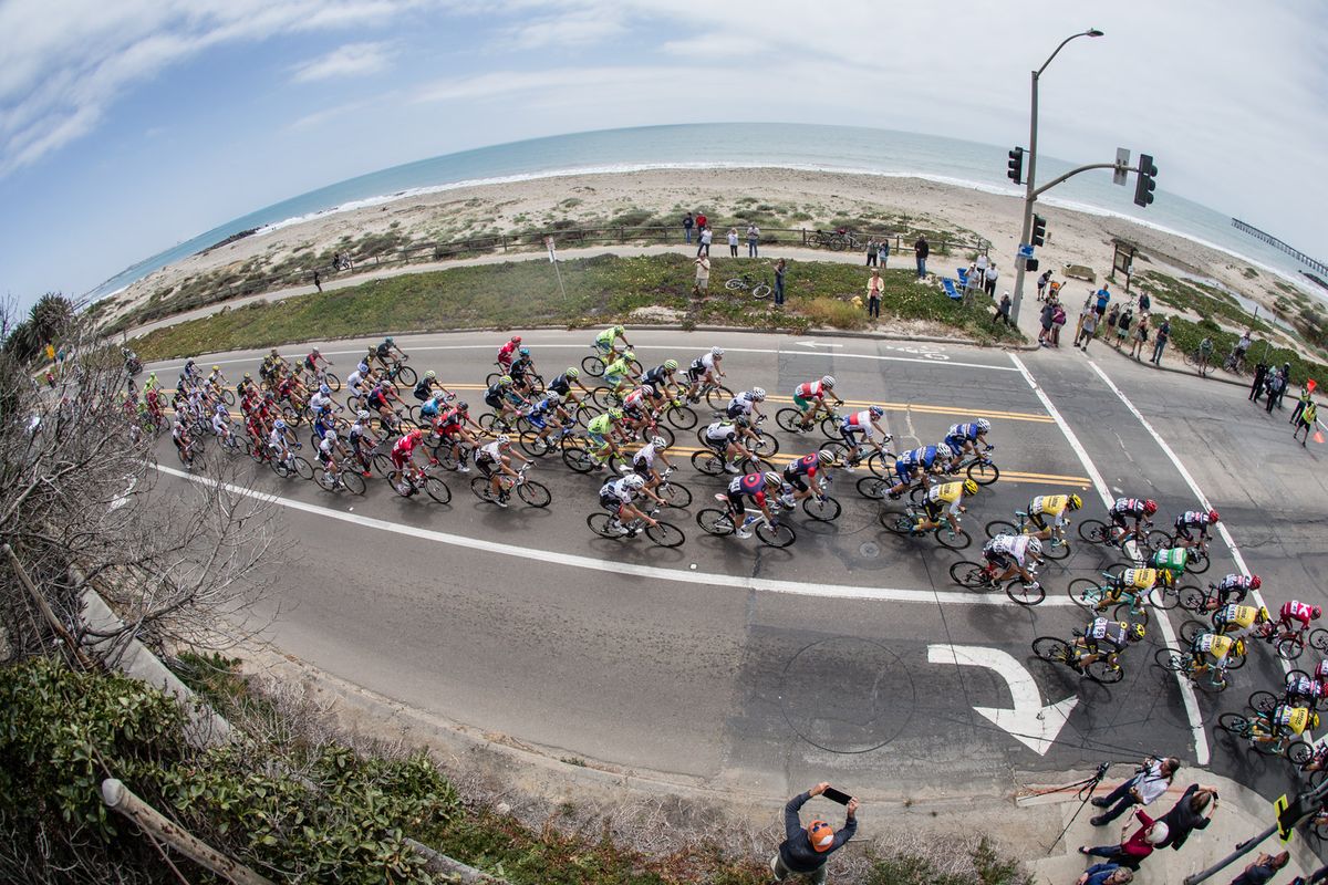 The peloton riding by the beaches