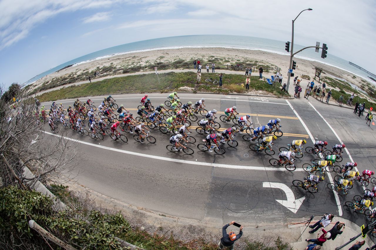 The peloton riding by the beaches