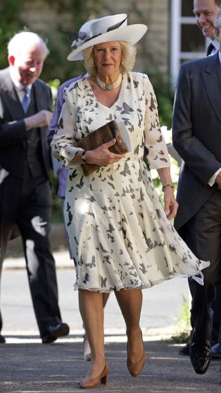 Queen Camilla in a butterfly dress