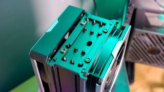 A Cooler Master Hyper 612 Apex on a desk and installed on a gaming PC.