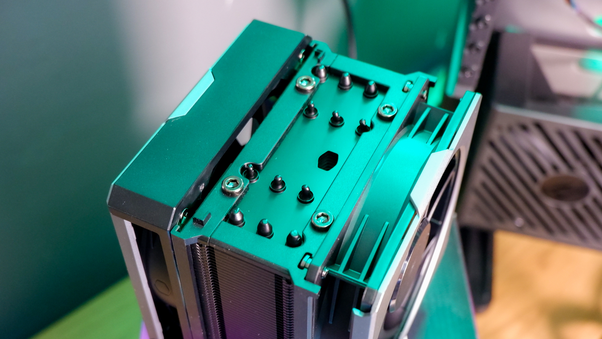 A Cooler Master Hyper 612 Apex on a desk and installed on a gaming PC.