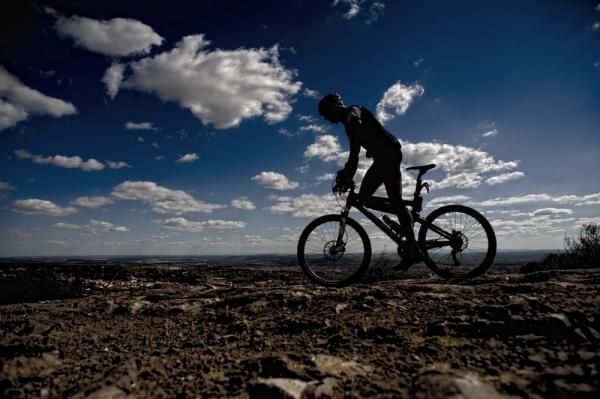 A racer on a bright and sunny stage 3