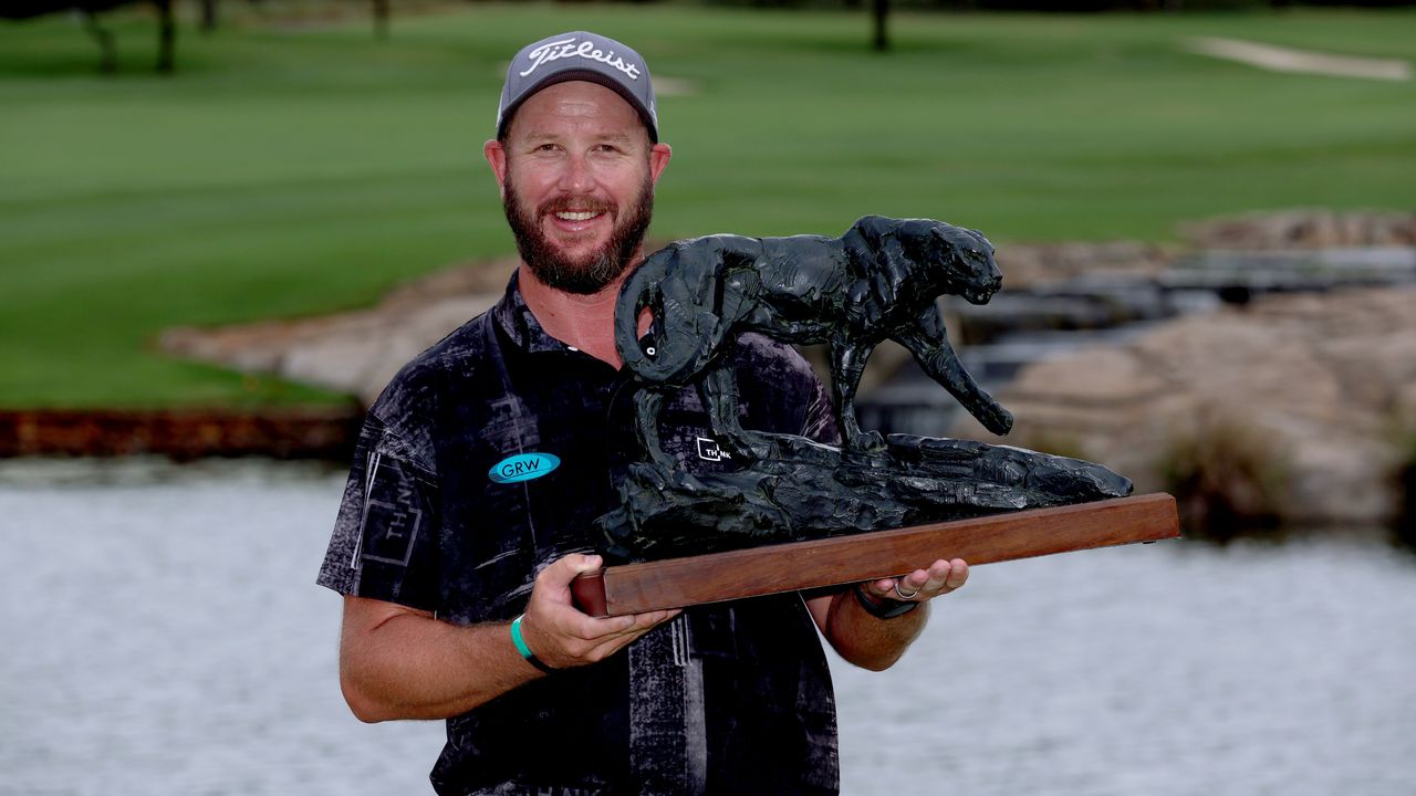 Ockie Strydom with the Alfred Dunhill Championship trophy after his 2022 win