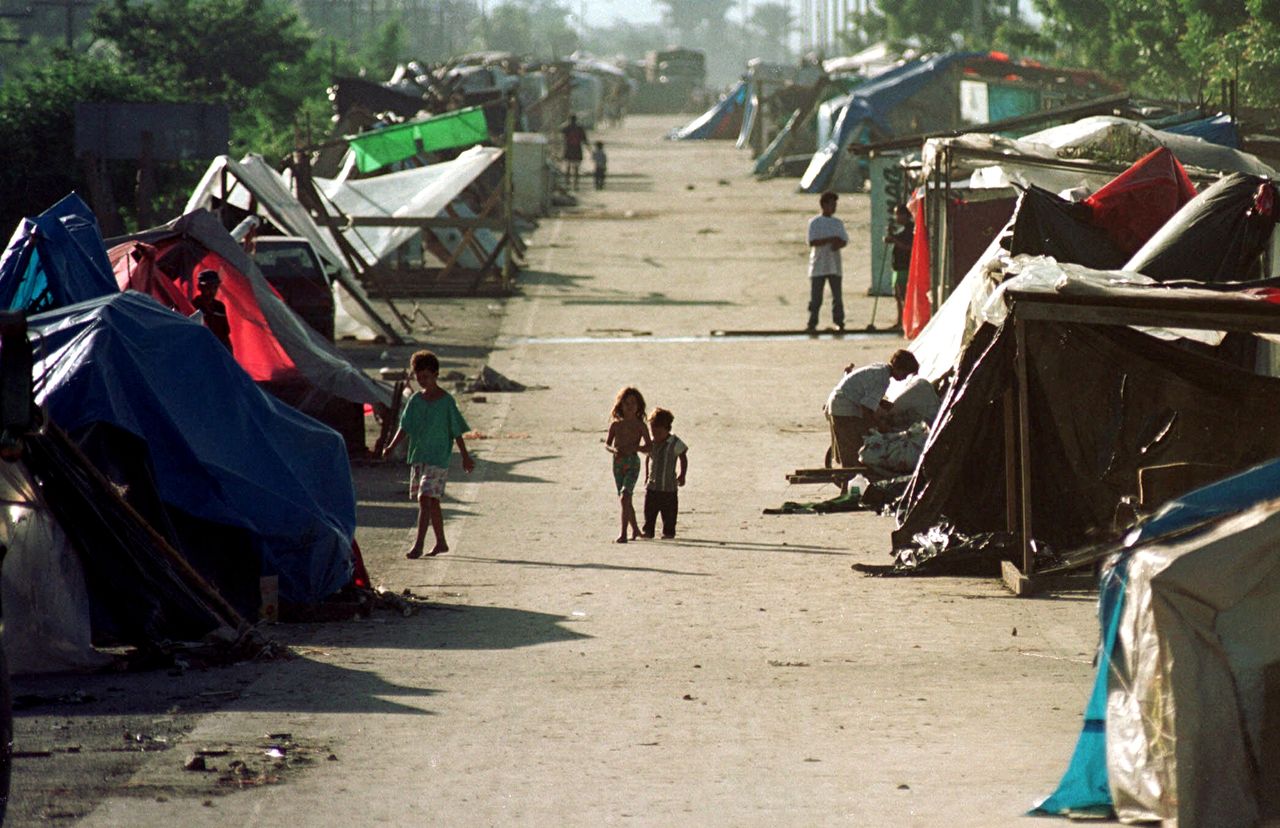 Hondurans after Hurricane Mitch.