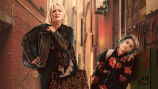 Costello Jones (Daisy May Cooper) and Iris (Fleur Tashjain) posed in a back alley for Rain Dogs